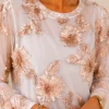 Top Met Gouden bloem Top Met Gouden bloem