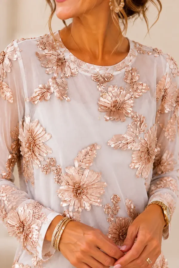 Top Met Gouden bloem Top Met Gouden bloem