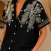 Zwarte Damesblouse met Goud Borduursel Zwarte Damesblouse met Goud Borduursel