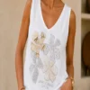 Top met Glittersteentjes Top met Glittersteentjes