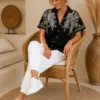 Zwarte Damesblouse met Goud Borduursel Zwarte Damesblouse met Goud Borduursel