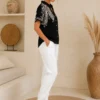 a4f88d52-bc1d-410a-aa07-d7c2d9980c7e Zwarte Damesblouse met Goud Borduursel