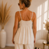 Beige One-Size top met ingelegde pailletten en verstelbare schouderbandjes . Achter Beige One-Size top met ingelegde pailletten en verstelbare schouderbandjes . Achter