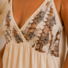 Beige One-Size top met ingelegde pailletten en verstelbare schouderbandjes . Detail Beige One-Size top met ingelegde pailletten en verstelbare schouderbandjes . Detail