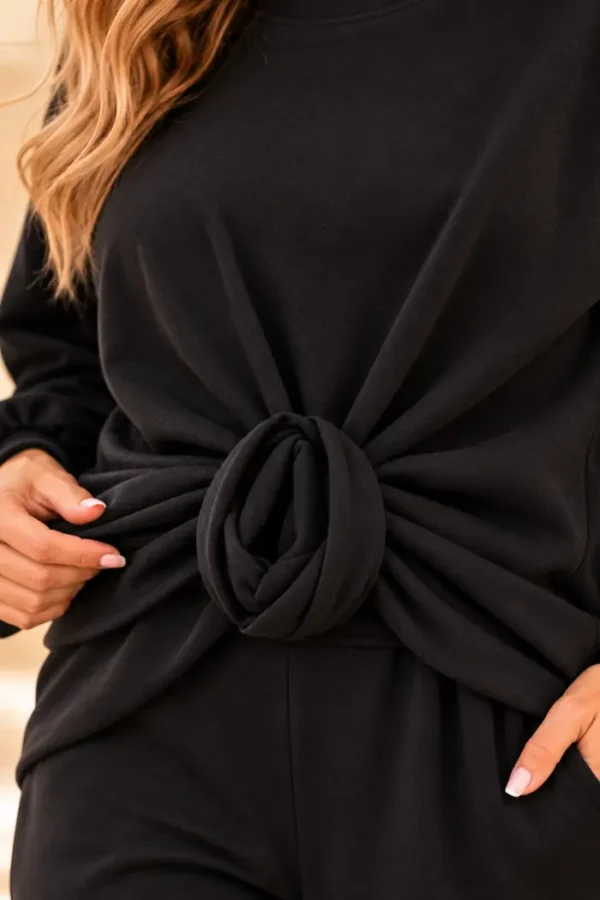 Zwart dames vrijetijdspak met knoopdetail Zwart dames vrijetijdspak met knoopdetail